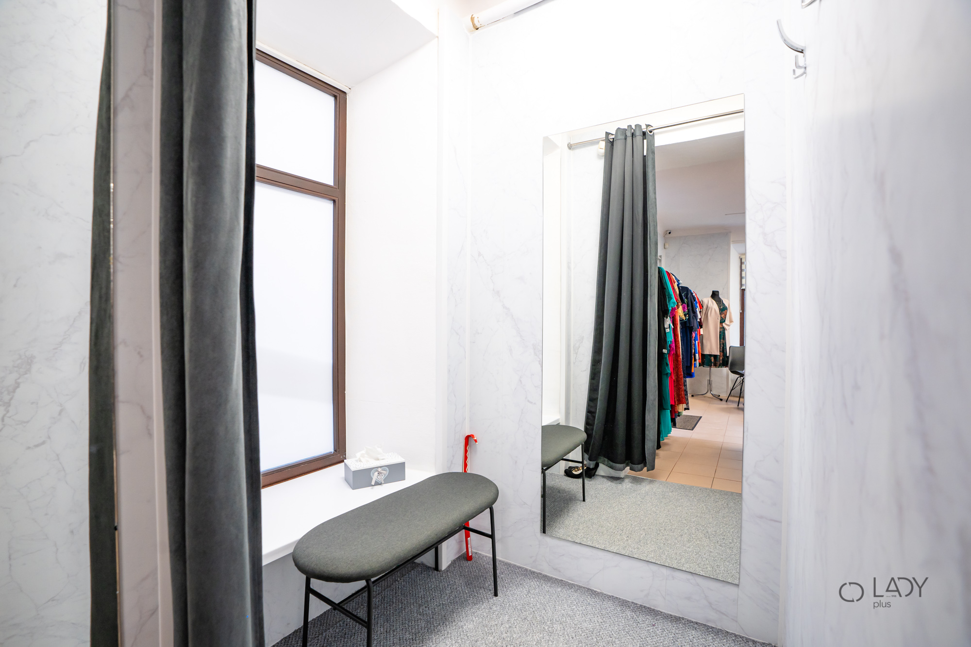 Boutique butik for dametøj i store størrelser, graviditetstøj