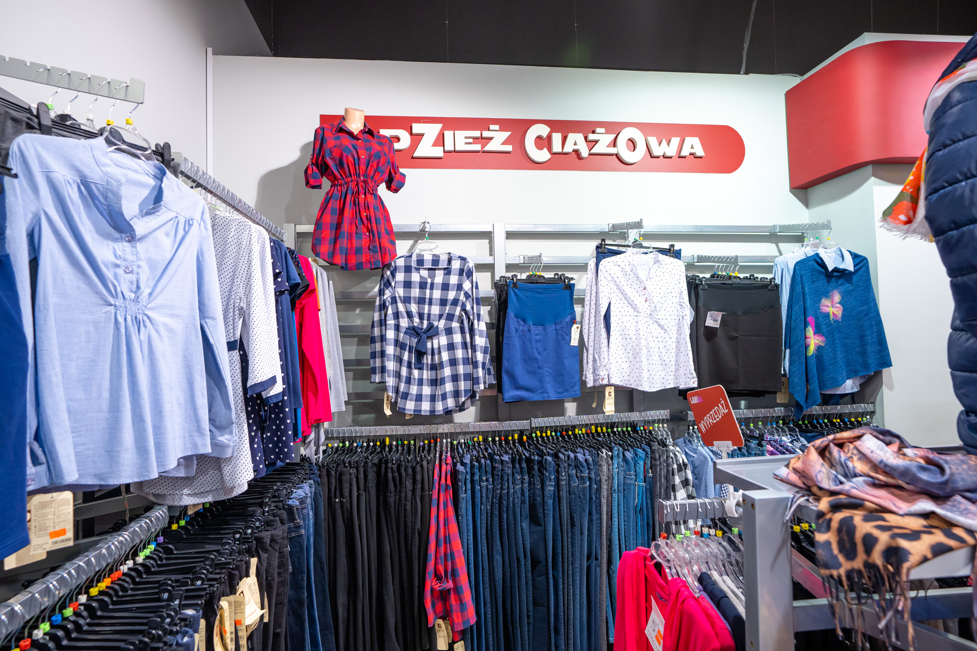 Boutique butik for dametøj i store størrelser, graviditetstøj